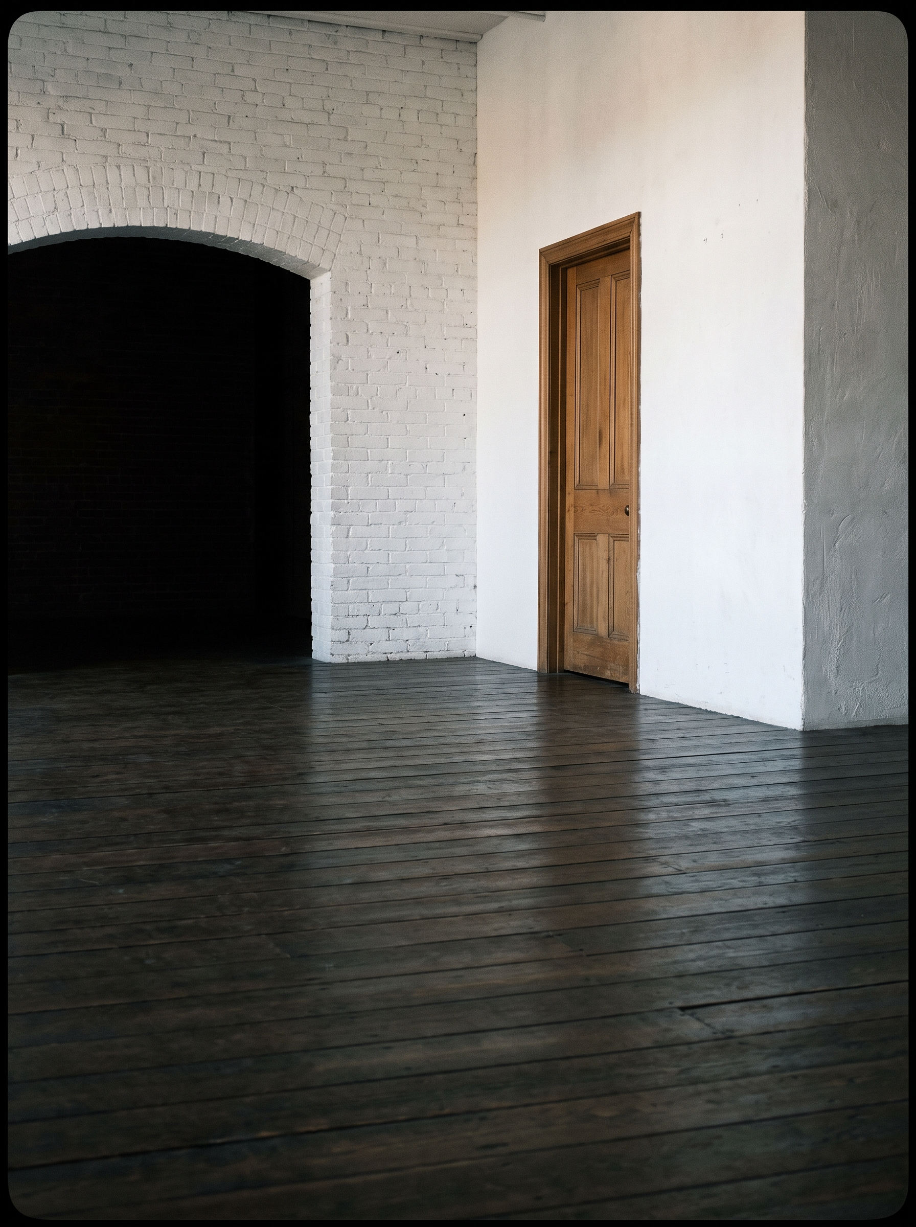 An empty studio floor in soft north light, before anyone arrives