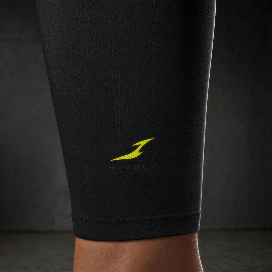 Woman wearing HIVOLT Solid High Rise Leggings, detail closeup