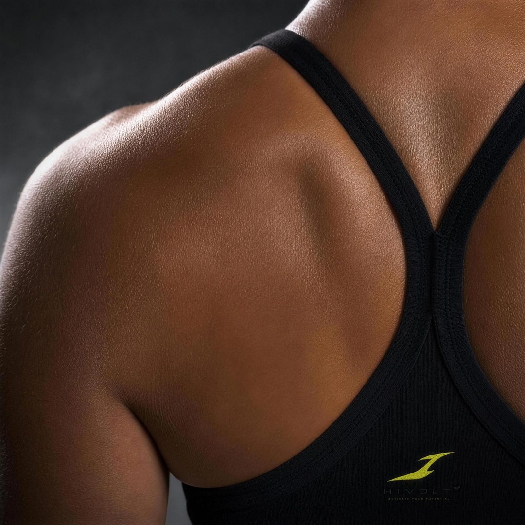 Woman wearing HIVOLT Tight Cropped Sports Bra, detail closeup