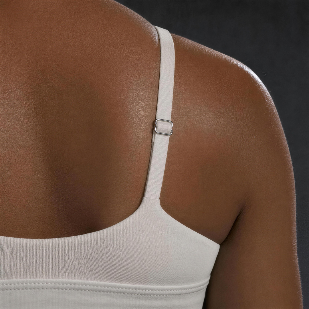 Woman wearing HIVOLT Cropped V-Neck Sports Bra, detail closeup