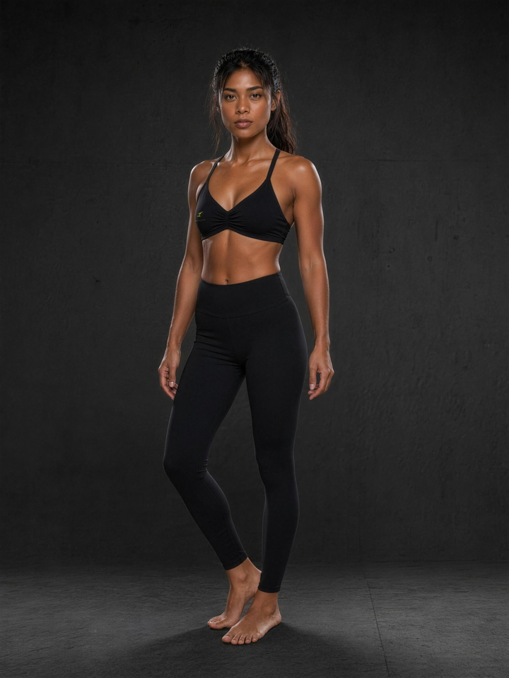 Woman wearing HIVOLT Ruched Halter-Neck Sports Bra, studio shot