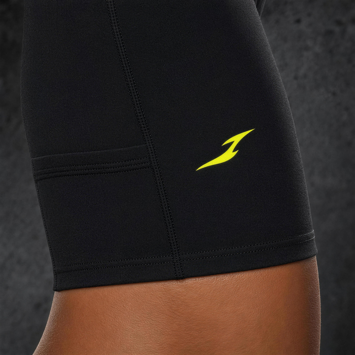 Woman wearing HIVOLT High-Waisted Pocket Biker Shorts, detail closeup