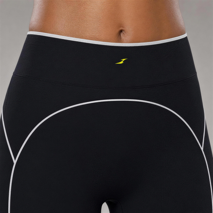 Woman wearing HIVOLT High Rise Topstitching Leggings, detail closeup