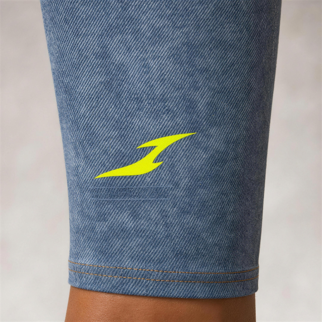 Woman wearing HIVOLT Faux Denim Zip-Fly Leggings, detail closeup