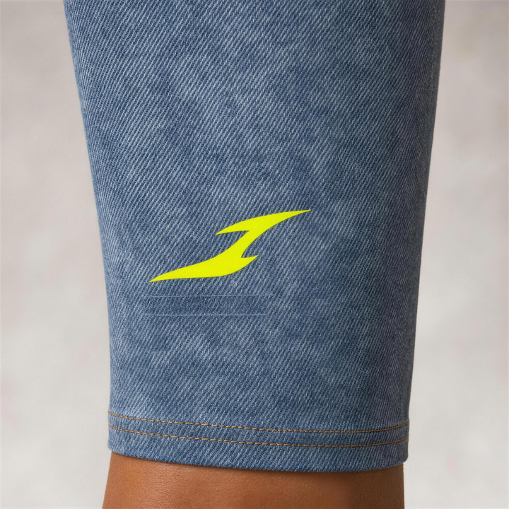 Woman wearing HIVOLT Faux Denim Zip-Fly Leggings, detail closeup